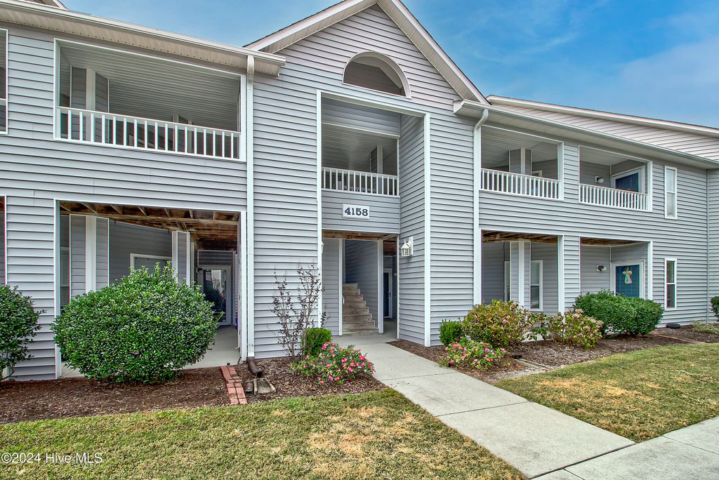Photo of 4158 Breezewood Drive #203, Wilmington, NC 28412 (MLS # 100539365)
