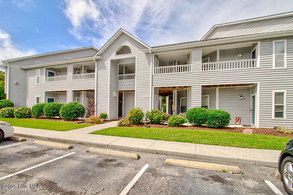 Photo of 4158 Breezewood Drive #203, Wilmington, NC 28412 (MLS # 100539365)