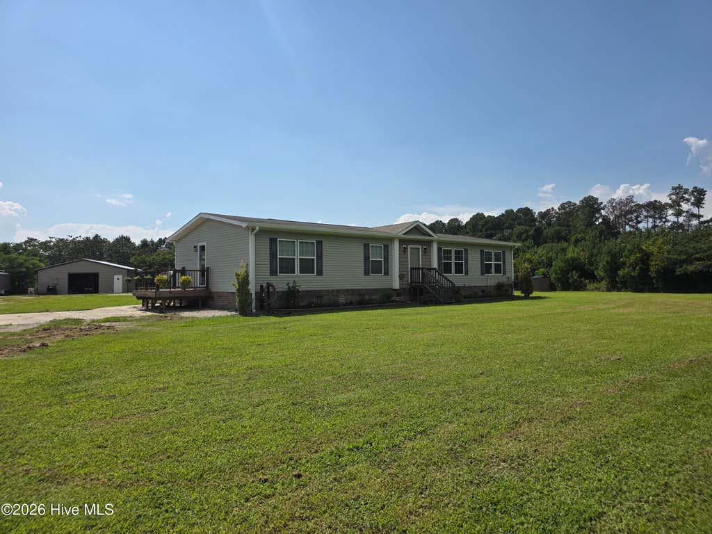 Photo of 873 Pameter Road, Hallsboro, NC 28442 (MLS # 100598128)