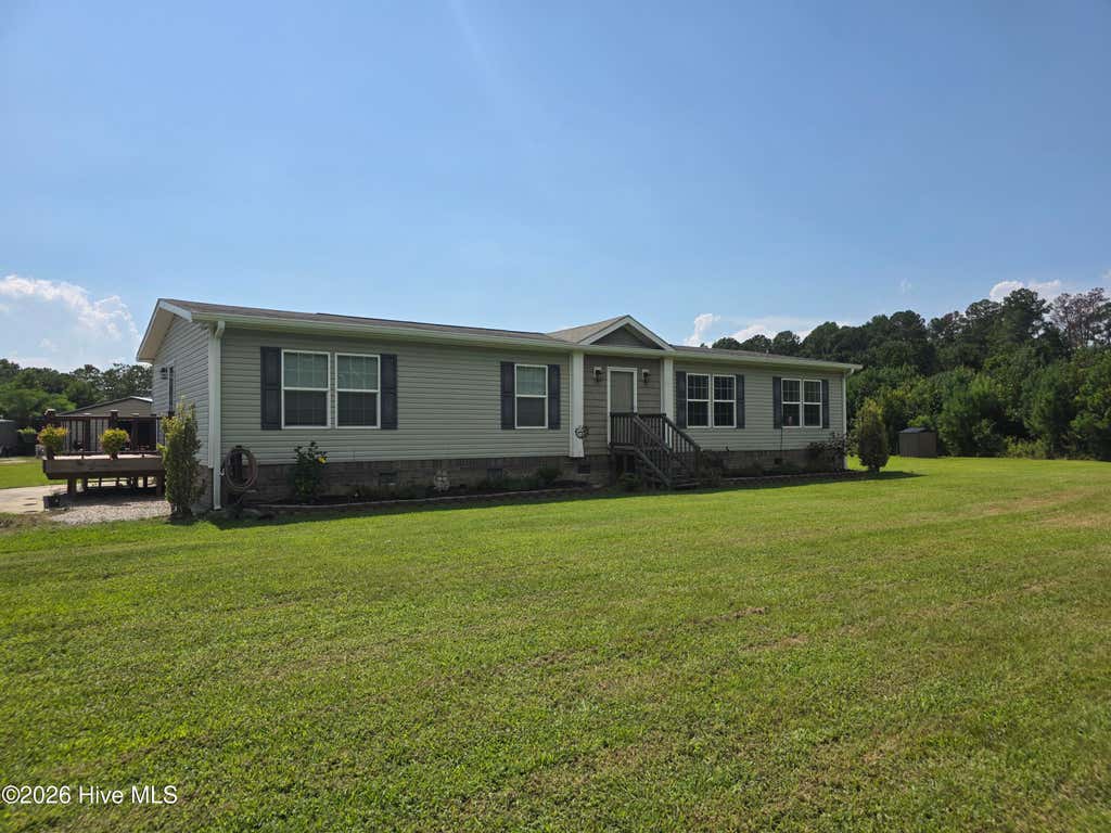 Photo of 873 Pameter Road, Hallsboro, NC 28442 (MLS # 100598128)