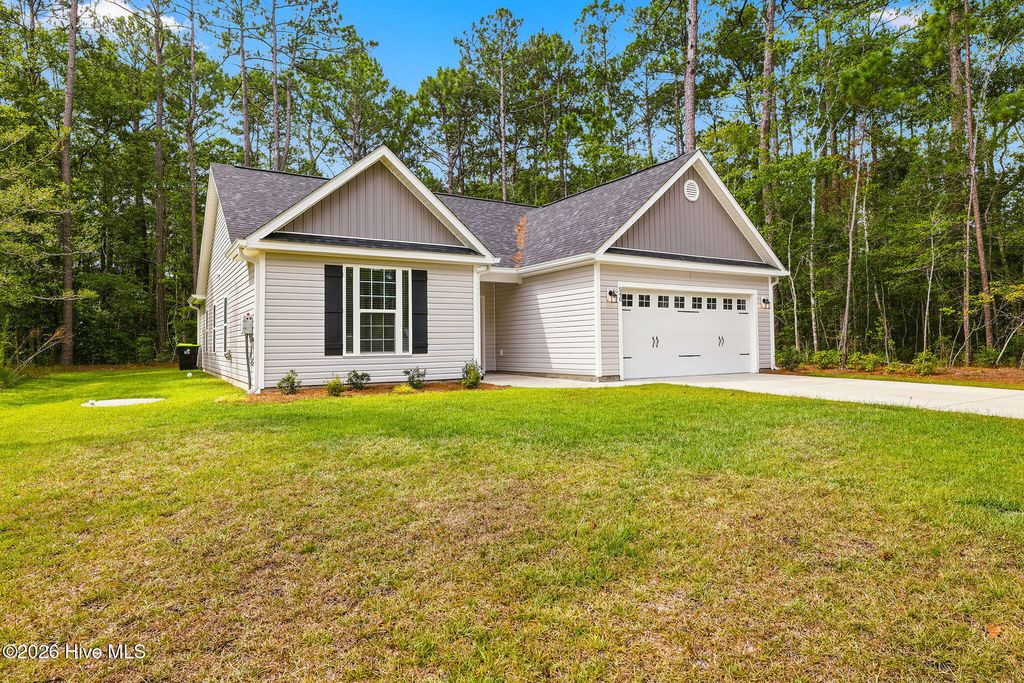 Photo of 548 Briarwood Drive NW, Calabash, NC 28467 (MLS # 100590643)