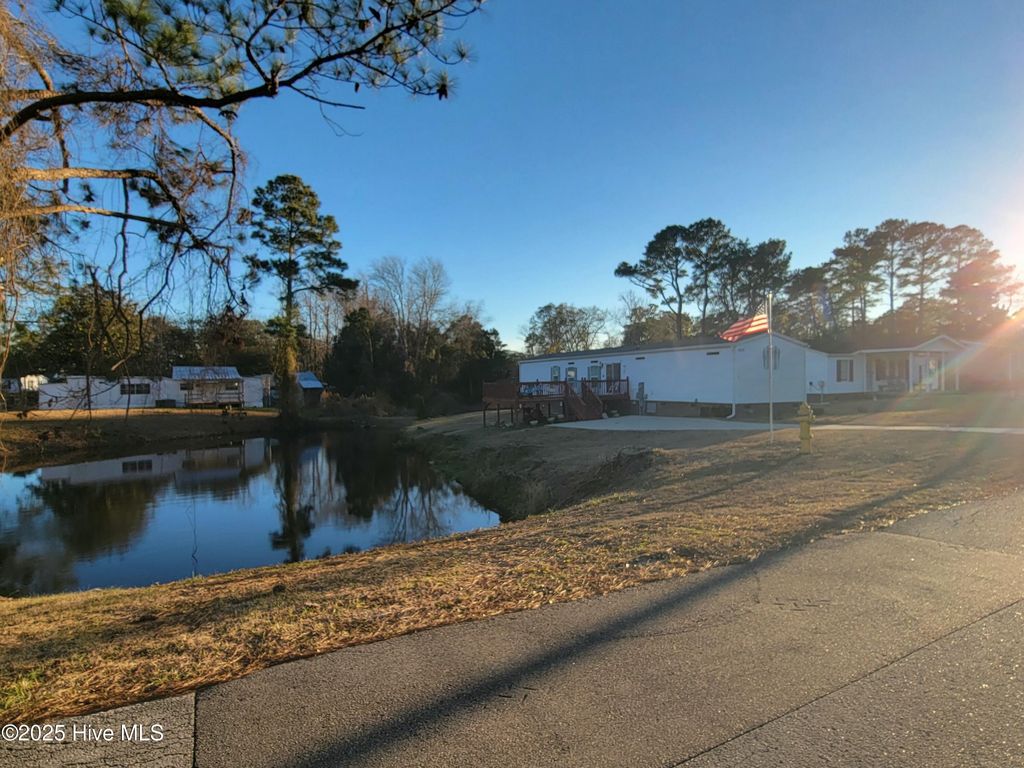 Photo of 820 Magnolia Drive, Sunset Beach, NC 28468 (MLS # 100540319)