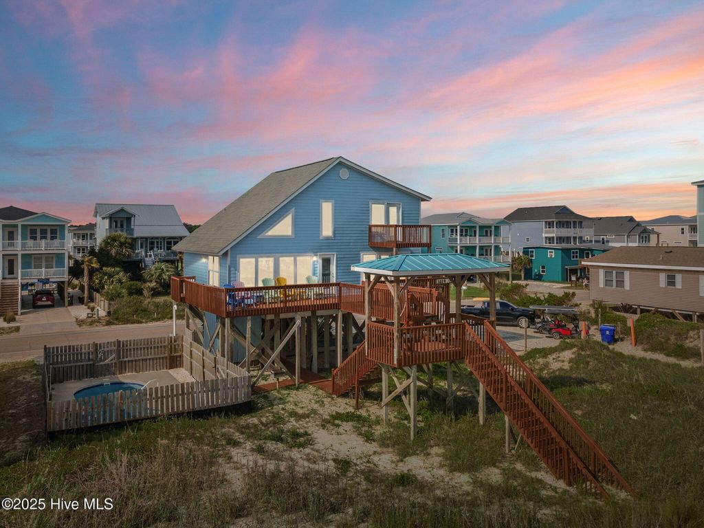 Photo of 3229 E Beach Drive, Oak Island, NC 28465 (MLS # 100508496)