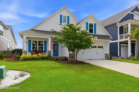 Photo of 401 Summerhouse Drive, Holly Ridge, NC 28445 (MLS # 100590496)