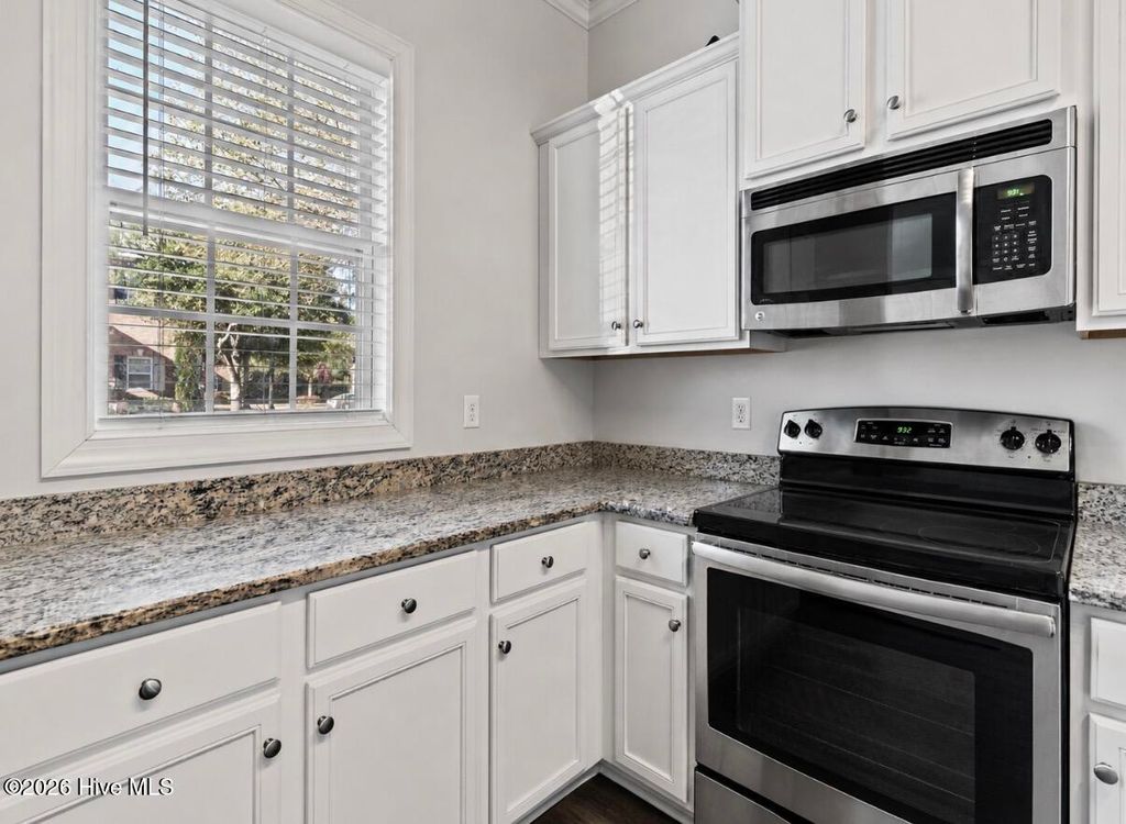 Photo of 4938 Exton Park Loop, Castle Hayne, NC 28429 (MLS # 100561470)