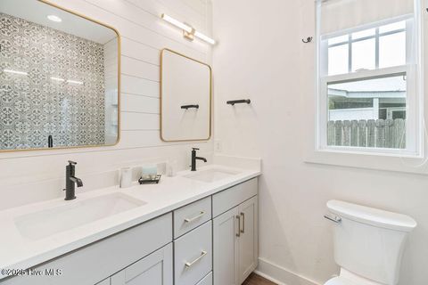 Tiny photo for 127 NW 20th Street, Oak Island, NC 28465 (MLS # 100550551)