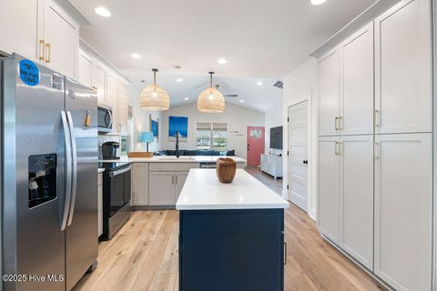 Tiny photo for 127 NW 20th Street, Oak Island, NC 28465 (MLS # 100550551)