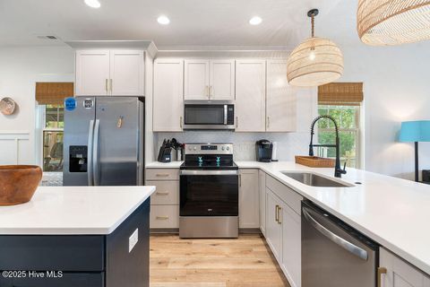 Tiny photo for 127 NW 20th Street, Oak Island, NC 28465 (MLS # 100550551)