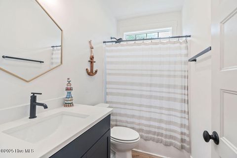 Tiny photo for 127 NW 20th Street, Oak Island, NC 28465 (MLS # 100550551)