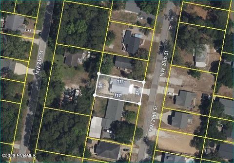 Tiny photo for 127 NW 20th Street, Oak Island, NC 28465 (MLS # 100550551)