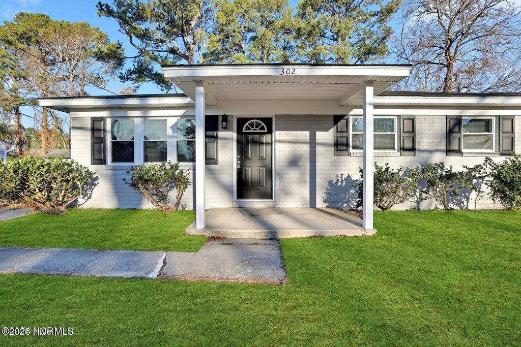 Photo of 302 Shamrock Drive, Jacksonville, NC 28540 (MLS # 100560964)