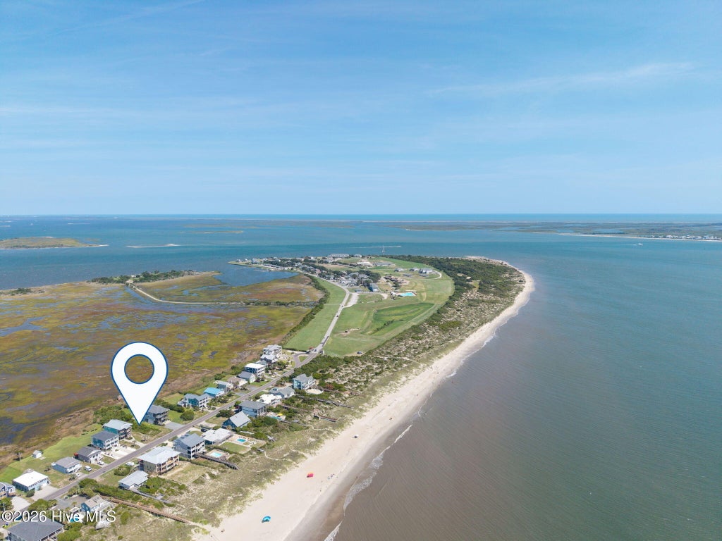 Photo of 128 Caswell Beach Road, Caswell Beach, NC 28465 (MLS # 100610798)