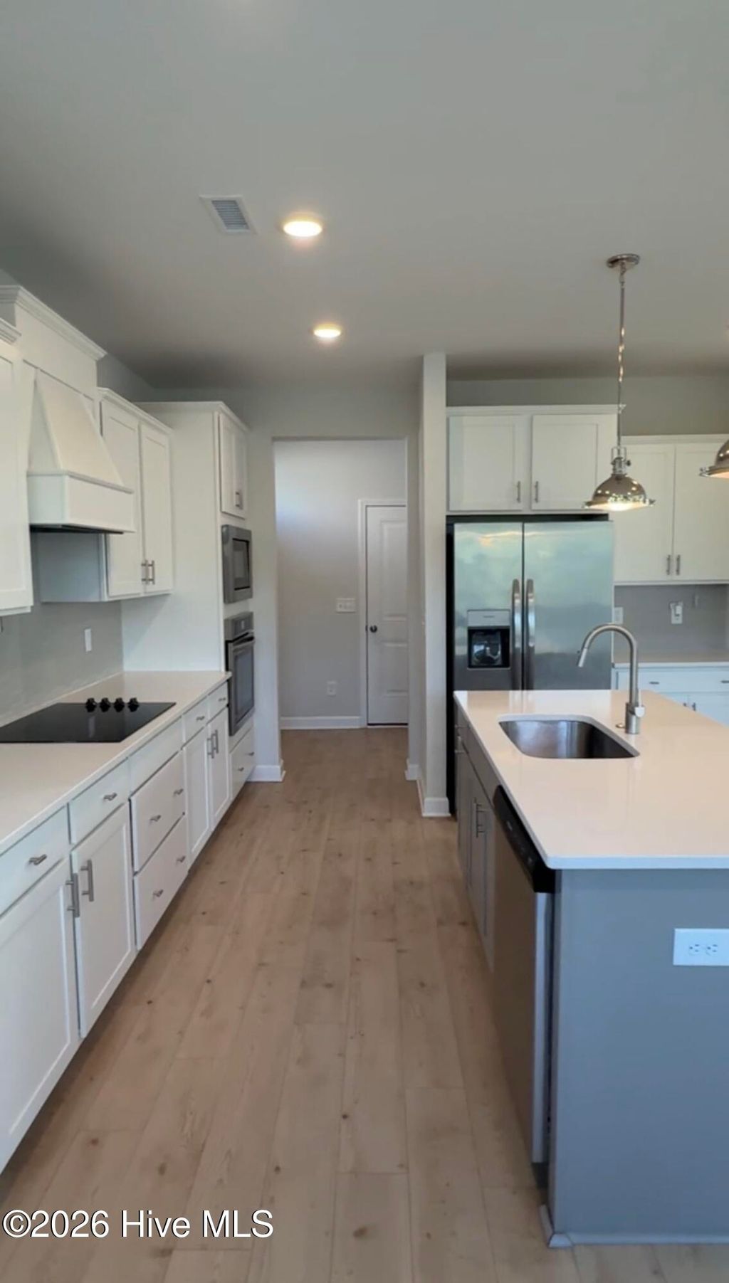 Photo of 90 Rigsby Avenue, Four Oaks, NC 27524 (MLS # 100565784)