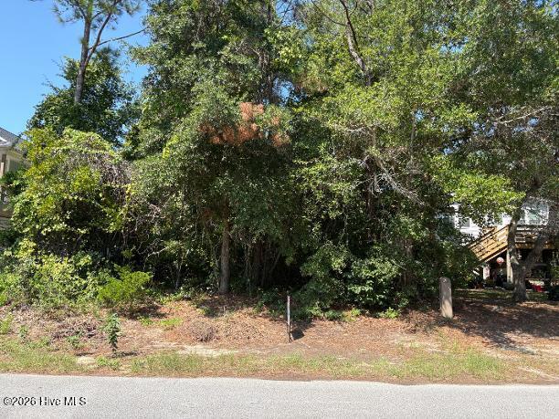Photo of 115 NE 5th Street, Oak Island, NC 28465 (MLS # 100601878)