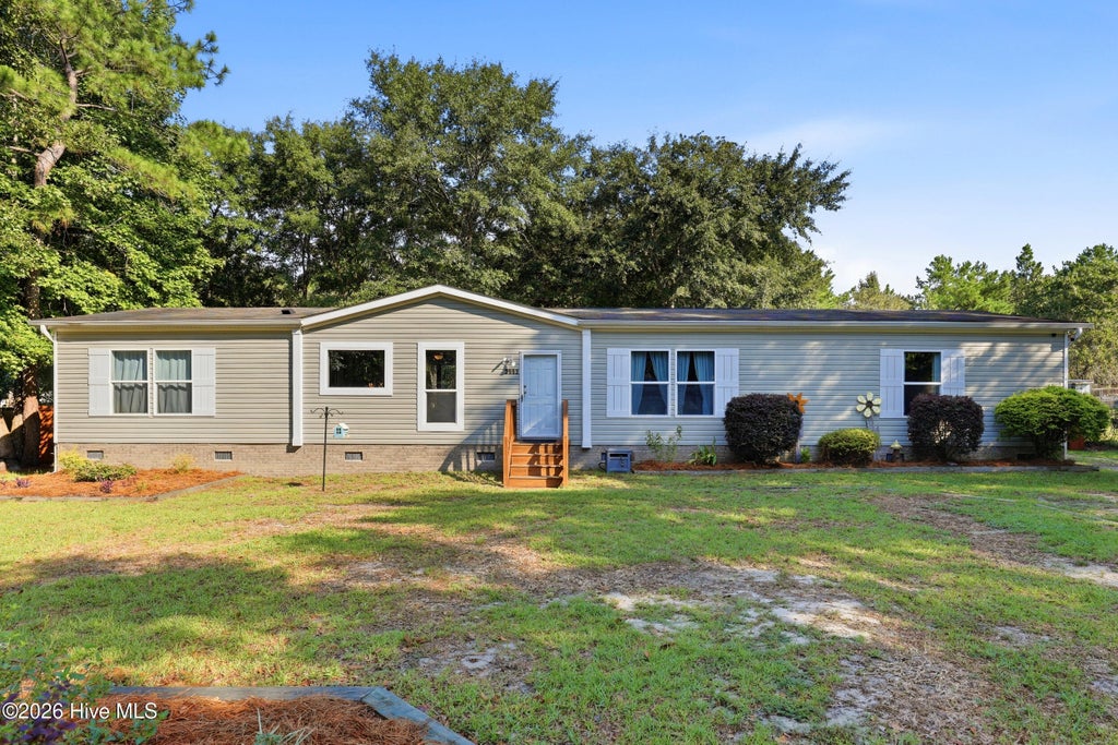 Photo of 3992 Sourwood Court NE, Leland, NC 28451 (MLS # 100599636)