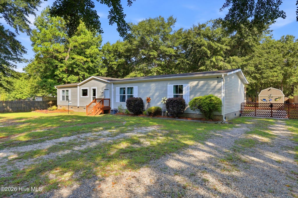 Photo of 3992 Sourwood Court NE, Leland, NC 28451 (MLS # 100599636)