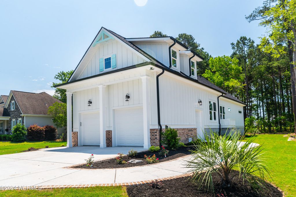 Photo of 527 S Middleton Drive NW, Calabash, NC 28467 (MLS # 100571561)