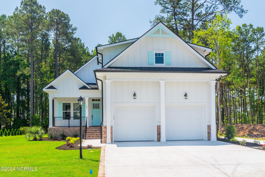 Photo of 527 S Middleton Drive NW, Calabash, NC 28467 (MLS # 100571561)