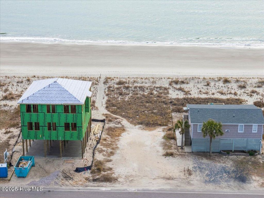 Photo of 4913 E Beach Drive, Oak Island, NC 28465 (MLS # 100488700)