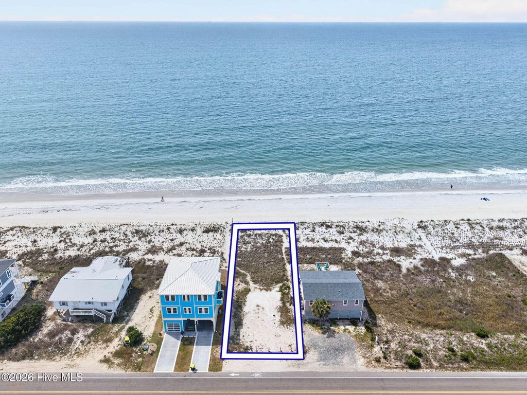 Photo of 4913 E Beach Drive, Oak Island, NC 28465 (MLS # 100488700)