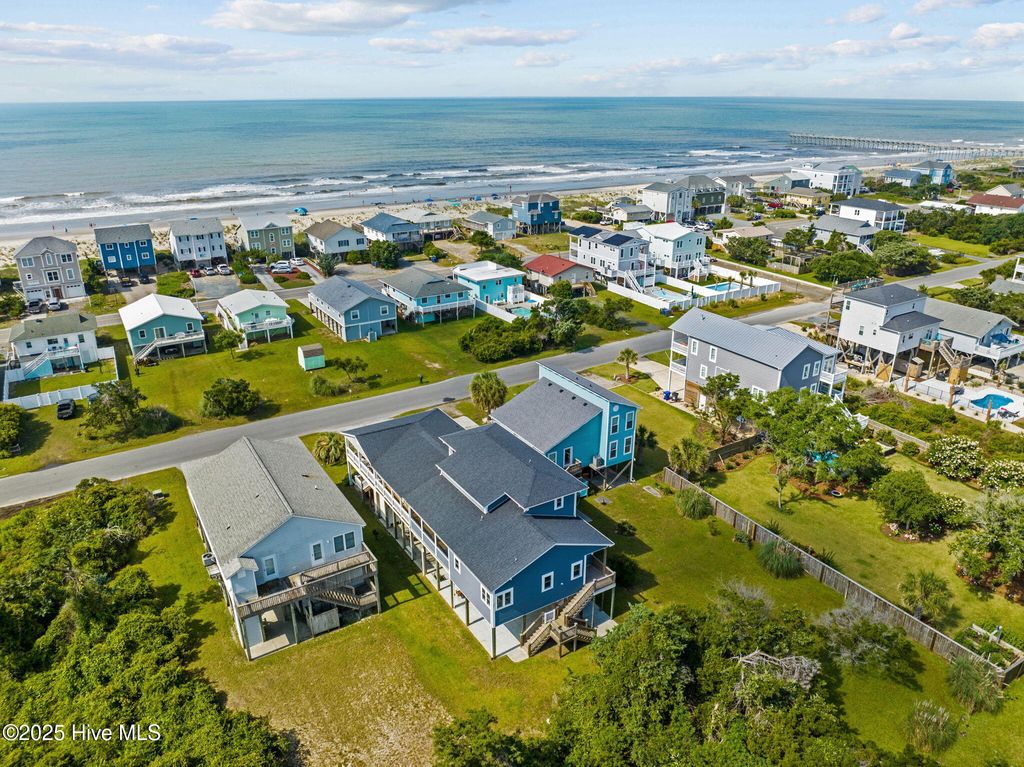 Photo of 1914 E Dolphin Drive, Oak Island, NC 28465 (MLS # 100541907)