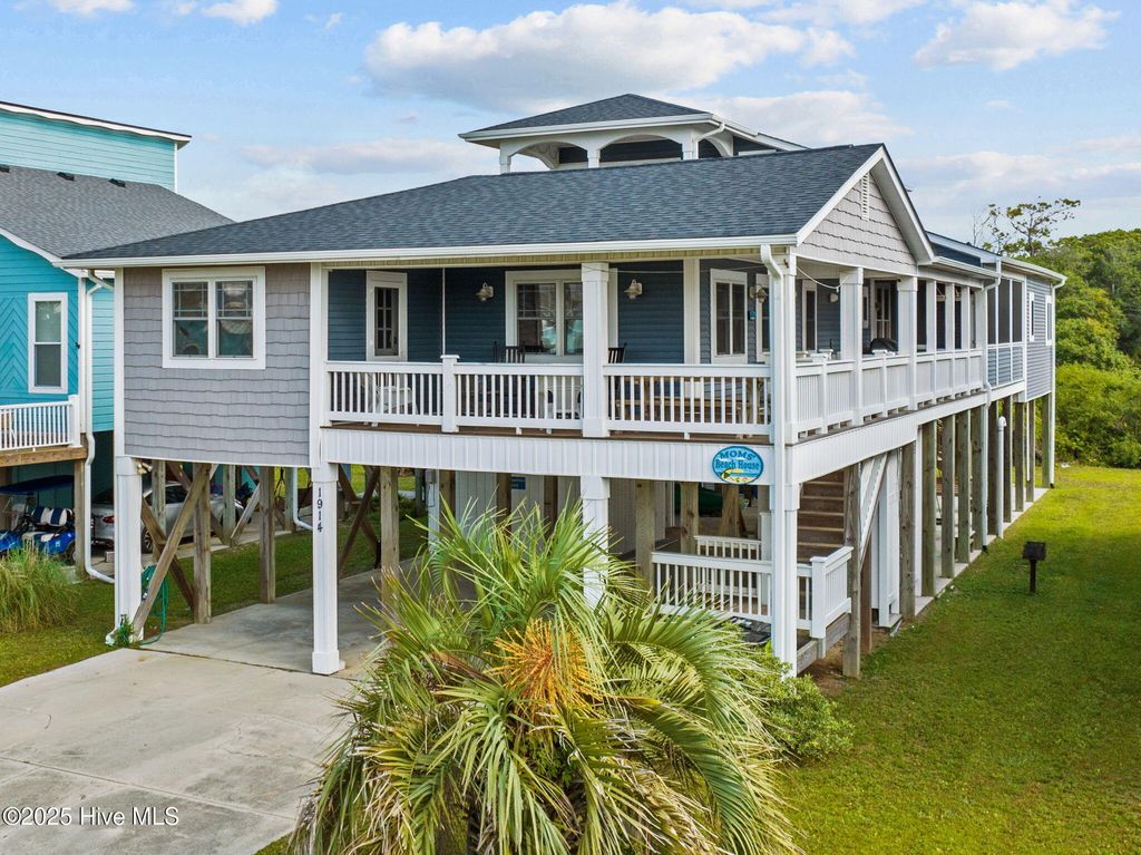 Photo of 1914 E Dolphin Drive, Oak Island, NC 28465 (MLS # 100541907)