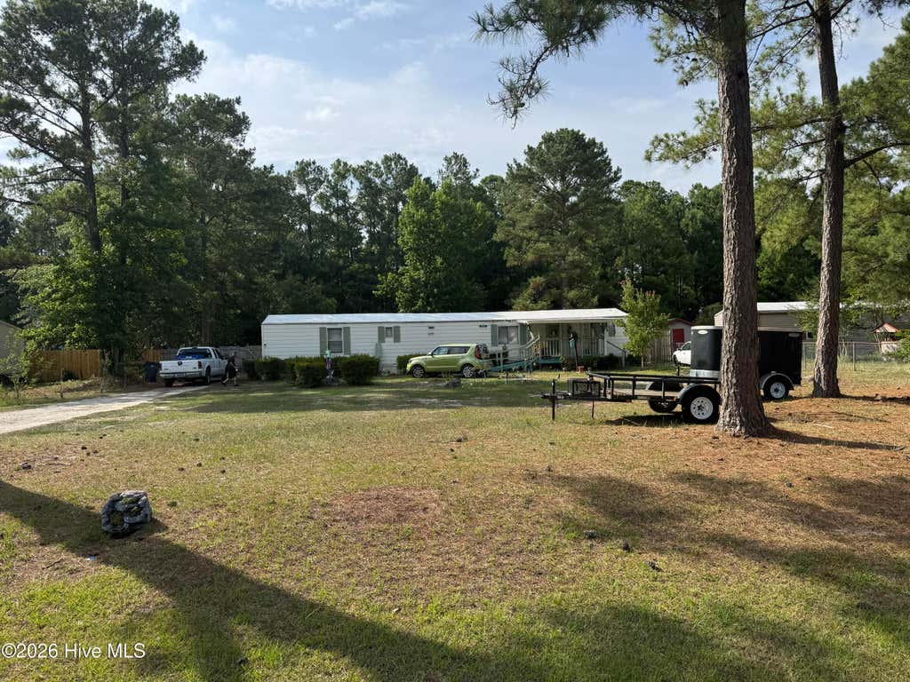 Photo of 9112 Highland Hills Drive NE, Leland, NC 28451 (MLS # 100586557)