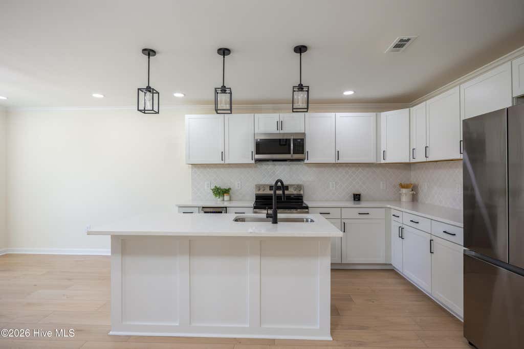 Photo of 103 Harmon Street, Clinton, NC 28328 (MLS # 100579934)