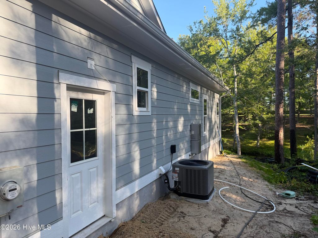 Photo of 803 Blue Gill Court SE, Bolivia, NC 28422 (MLS # 100571298)