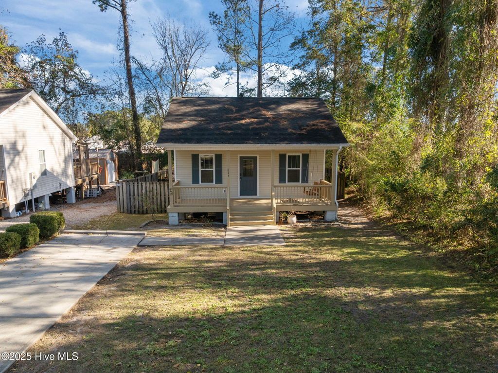Photo of 644 E Ocean Road, Holly Ridge, NC 28445 (MLS # 100544828)