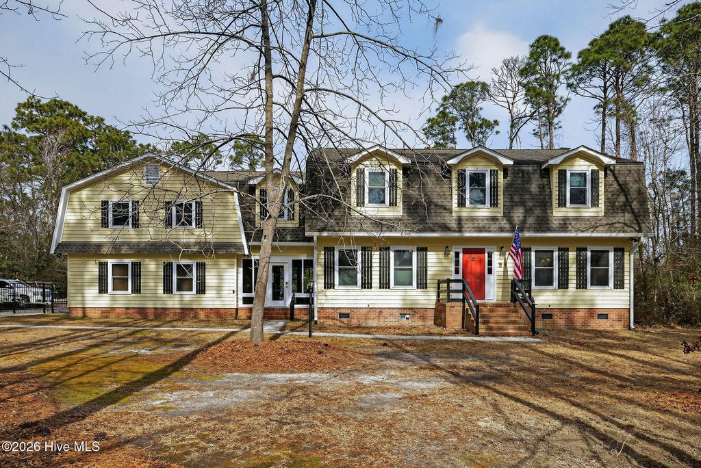 Photo of 10020 S Olde Towne Wynd, Belville, NC 28451 (MLS # 100552823)