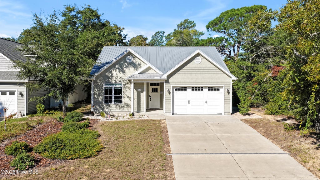 Photo of 115 NE 3rd Street, Oak Island, NC 28465 (MLS # 100610378)