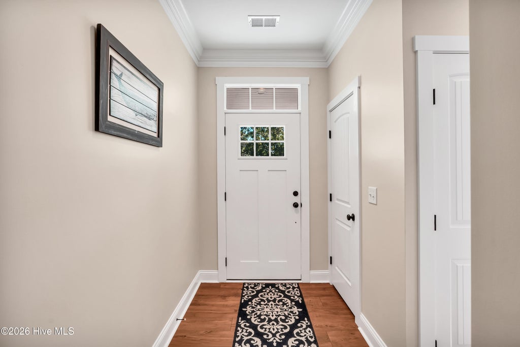 Photo of 115 NE 3rd Street, Oak Island, NC 28465 (MLS # 100610378)
