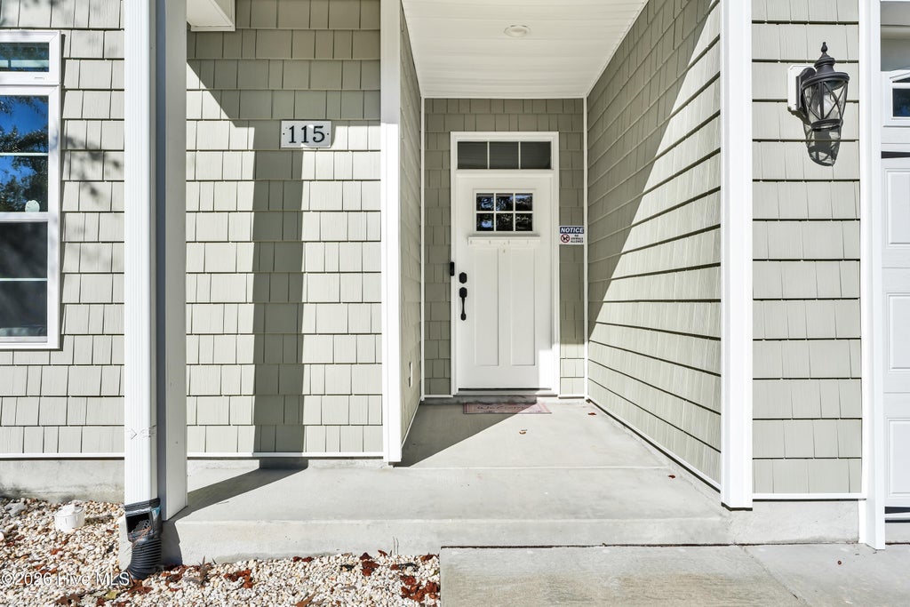 Photo of 115 NE 3rd Street, Oak Island, NC 28465 (MLS # 100610378)
