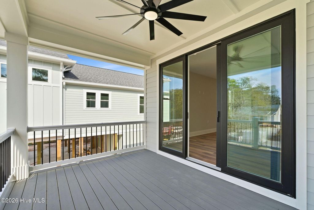 Photo of 210 NE 57th Street, Oak Island, NC 28465 (MLS # 100554131)