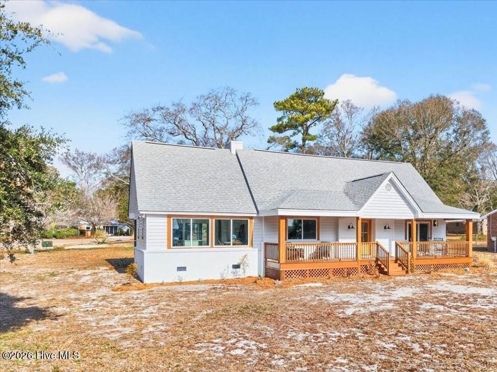 Photo of 501 Shoreline Drive E, Sunset Beach, NC 28468 (MLS # 100554376)