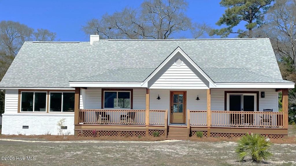 Photo of 501 Shoreline Drive E, Sunset Beach, NC 28468 (MLS # 100554376)