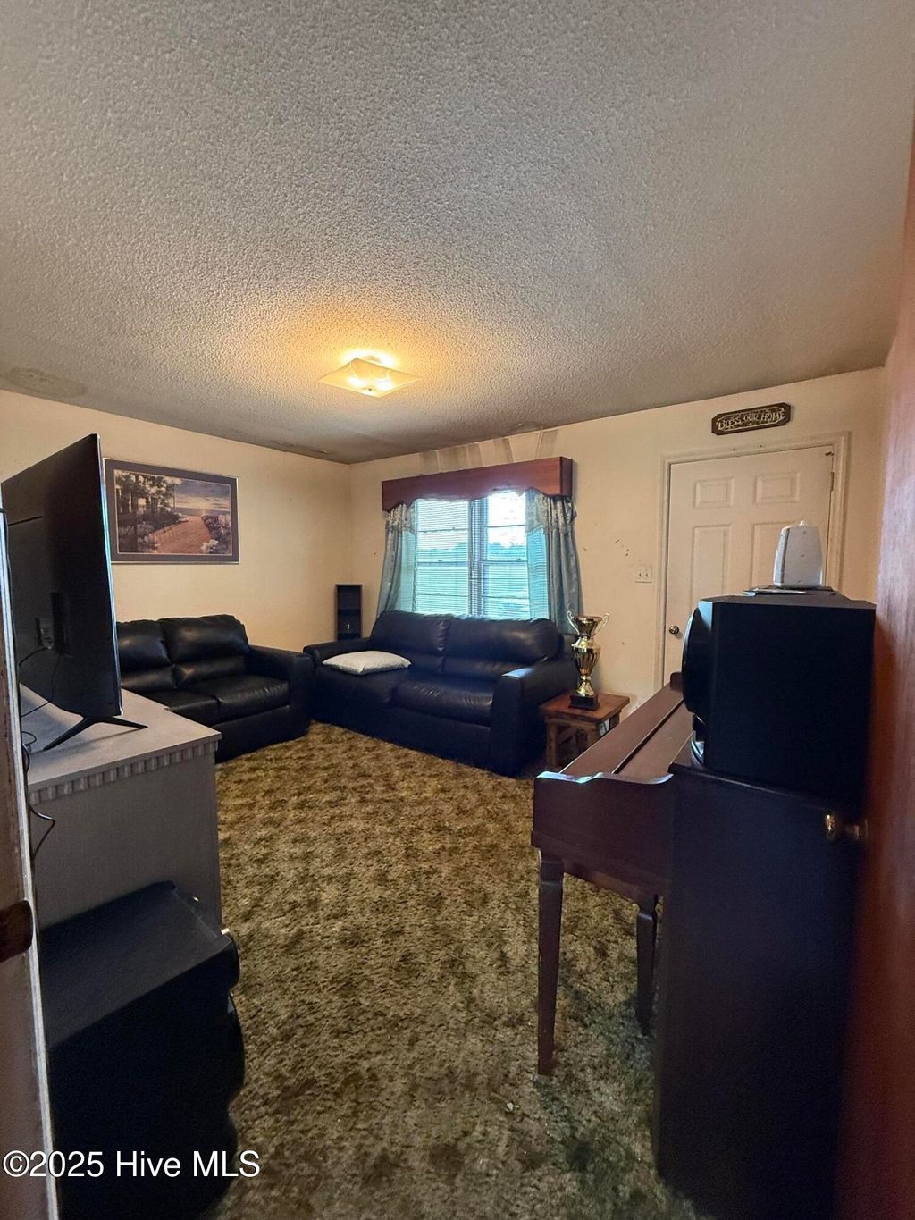 Photo of 6050 Bottoms Dairy Road, Elm City, NC 27822 (MLS # 100523837)