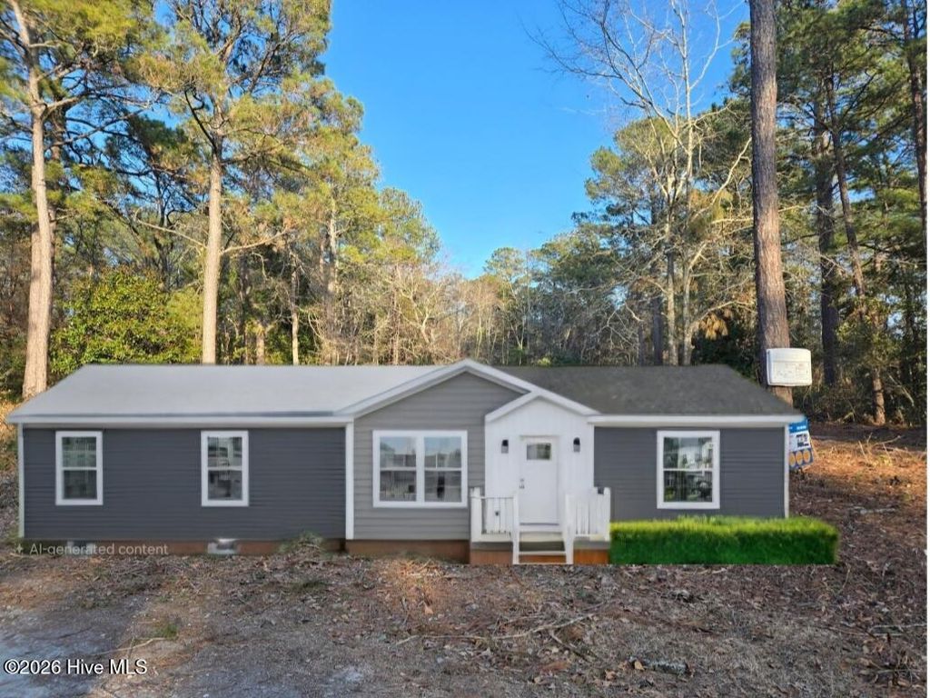 Photo of 409 Pond View Circle, Hampstead, NC 28443 (MLS # 100555925)