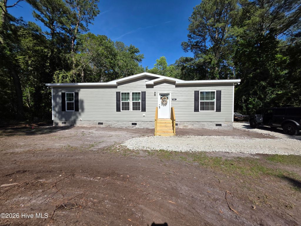 Photo of 409 Pond View Circle, Hampstead, NC 28443 (MLS # 100555925)