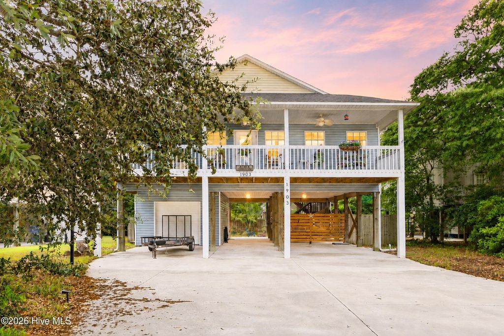 Photo of 1903 E Oak Island Drive, Oak Island, NC 28465 (MLS # 100574651)