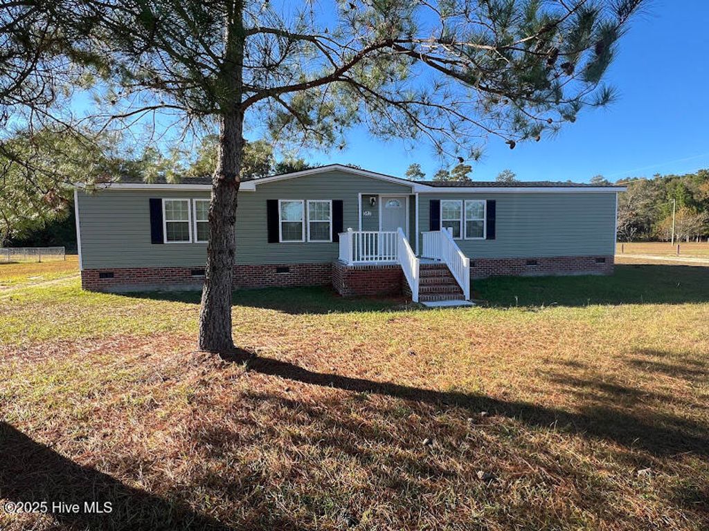 Photo of 542 Red Oak Farm Road, Tar Heel, NC 28392 (MLS # 100543225)