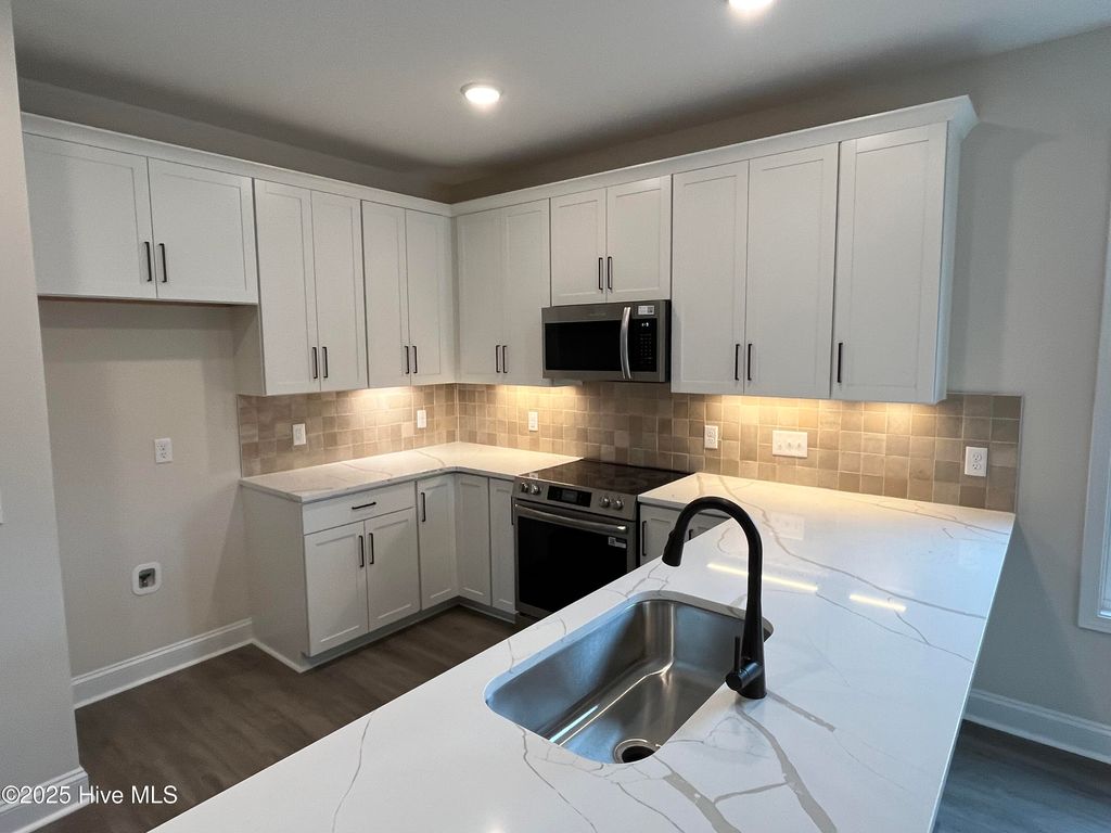 Photo of 27 N Bandwheel Way, Hampstead, NC 28443 (MLS # 100514298)