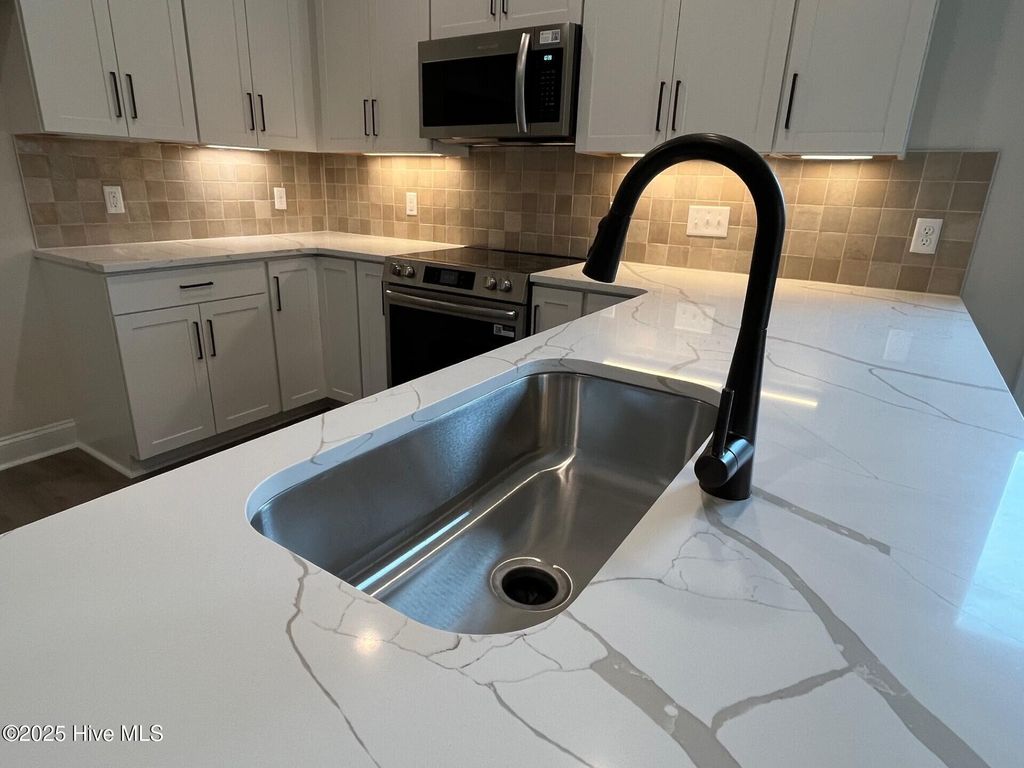 Photo of 27 N Bandwheel Way, Hampstead, NC 28443 (MLS # 100514298)