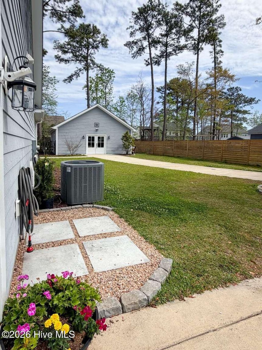 Photo of 114 Pebble Beach Drive, Hampstead, NC 28443 (MLS # 100566099)