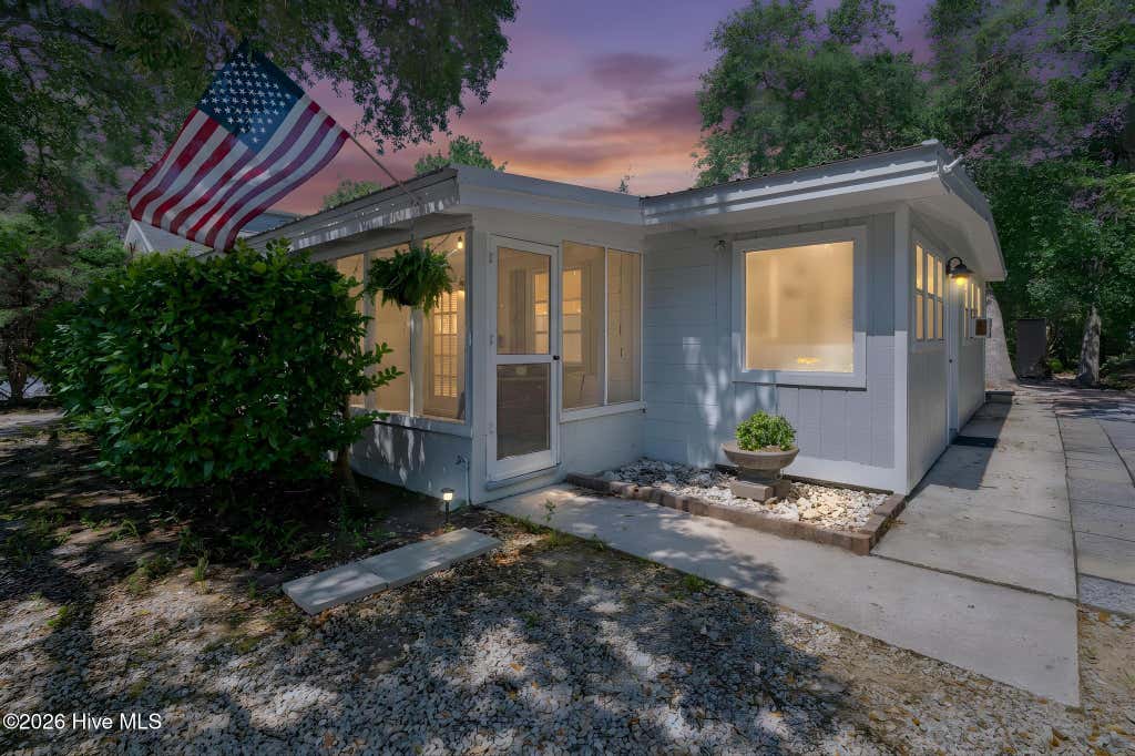 Photo of 147 NW 10th Street, Oak Island, NC 28465 (MLS # 100589665)