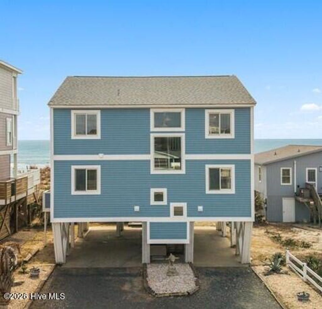 Photo of 1123 E Beach Drive, Oak Island, NC 28465 (MLS # 100556593)