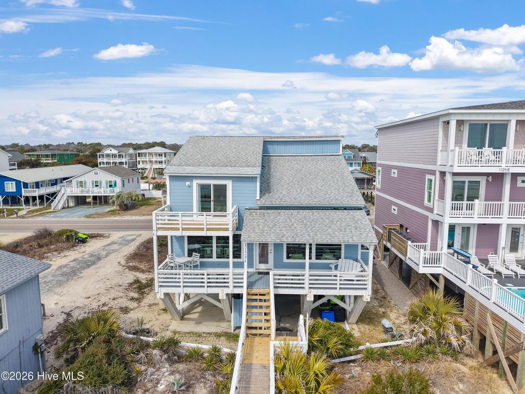 Photo of 1123 E Beach Drive, Oak Island, NC 28465 (MLS # 100556593)