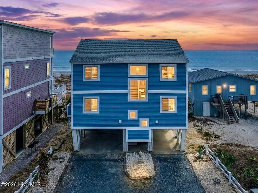 Photo of 1123 E Beach Drive, Oak Island, NC 28465 (MLS # 100556593)