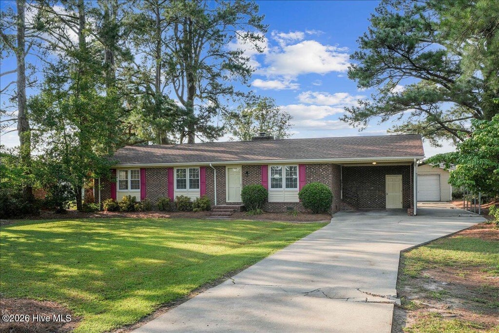 Photo of 5419 Wayne Memorial Drive NE, Pikeville, NC 27863 (MLS # 100592790)
